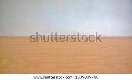 Texture, wallpaper, background of an old white-beige concrete and wooden wall or door in public or residential buildings in the middle of a cloudy day.