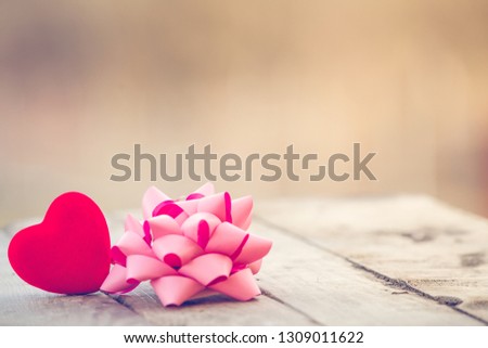 Red heart and pink ribbon St Valentine background