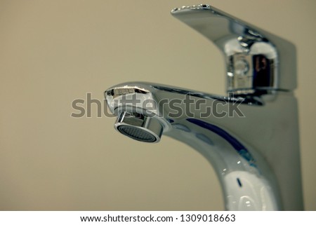 Modern bathroom faucet close up picture