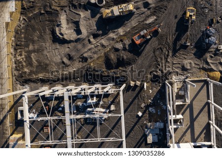 Aerial view. Construction site shot from above. Industrial place. Photo captured with drone.