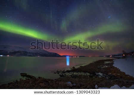 Northern lights in the sky over Tromso,  Norway