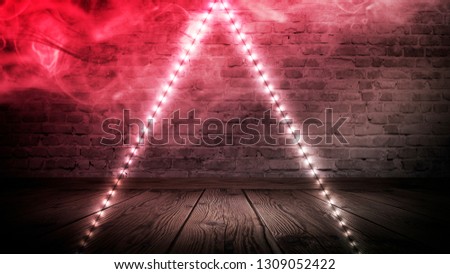 Illumination of an empty brick wall, neon light, smoke. The night scene of an empty room is decorated with abstract light. Night smoke.
