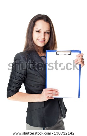 Portrait of beautiful young smiling businesswoman showing blank clipboard isolated on white background