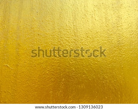 Gold cement wall texture for background
