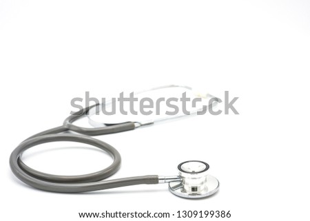 old gray stethoscope  on white background