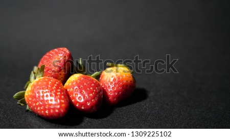 Red, juicy strawberries, blur background