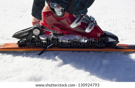 Skiing equipment on snow, shoes and ski
