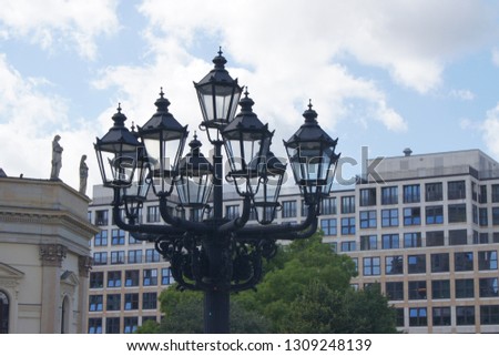 Building in the city. High lantern on the street. Background