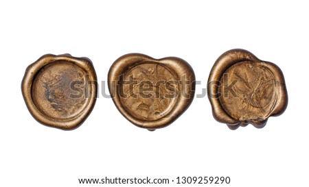 Set of old vintage golden wax seals or stamps for retro mail envelope isolated on white background Royalty-Free Stock Photo #1309259290