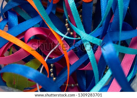 Pile of colorful ribbons background