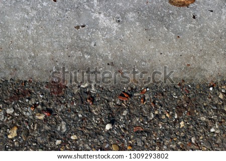 Melting snow asphalt stone grit slush road