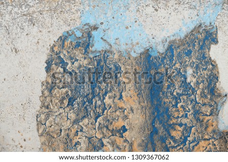 Close up high resolution surface of weathered paint on a wall