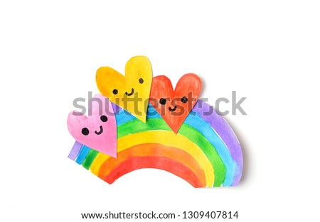 colorful paper hearts and rainbow on white background. symbol of love, joy, kindness, happiness. children creativity concept. flat lay. copy space