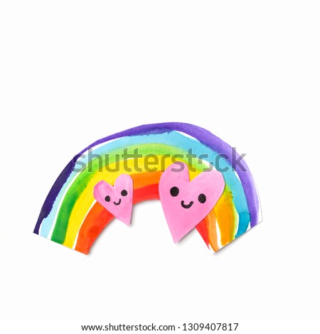handmade colorful paper hearts and rainbow on white background.  symbol of love, joy, kindness, happiness. children creativity concept. flat lay. copy space