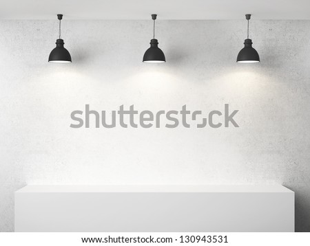 white room with presentation cube and three lamp