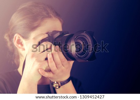 Photographer Holding Camera