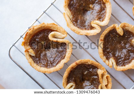 Canadian Butter Tarts Royalty-Free Stock Photo #1309476043