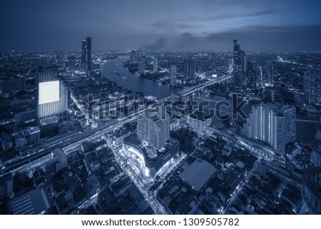 Bangkok night cityscape with modern buildings and street light, vintage process style