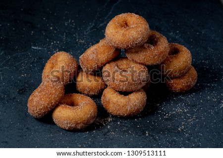 Cinnamon Sugar Mini Donuts Royalty-Free Stock Photo #1309513111