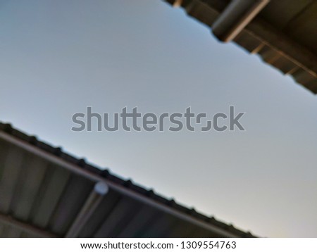 blurred photo Roof parking lot and blue sky background