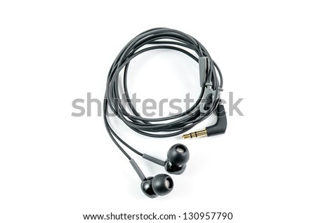 black earphones on a white background Royalty-Free Stock Photo #130957790