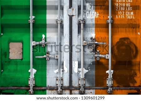 Close-up of a container with the national flag of Ireland. The concept of export-import Ireland and the national delivery of goods.