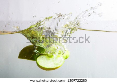 Fruits fall into the water