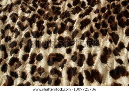 Modern stylish fabric jaguar texture close up background