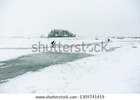 Ice skating on natural ice in the Netherlands, Friesland.