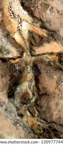 frowning, abstract photography of the deserts of Africa from the air. aerial view of desert landscapes, Genre: Abstract Naturalism, from the abstract to the figurative, 
