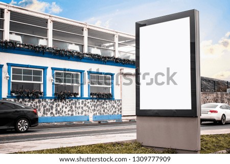 billboard mockup and template signboard blank advertising or light box with copy space for your text message or media and content, signage with shadow in dark frame with city wall background display