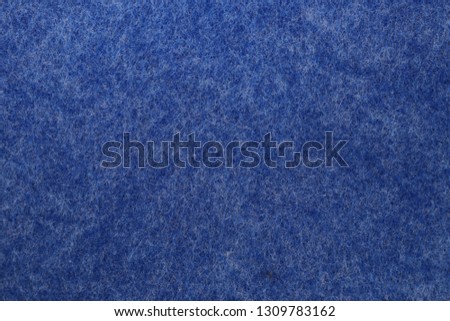 Blue felt texture background. Blue is a cool and calming color that shows creativity and intelligence. 