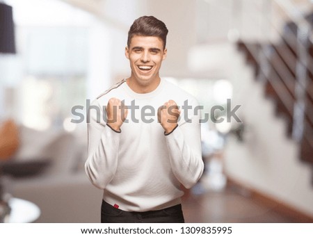 Young authentic man surprised and shocked