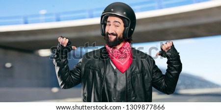 motorbike rider proud and satisfied