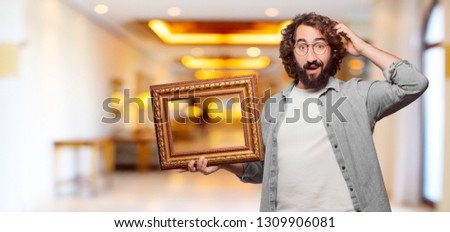 young fool man with a baroque frame