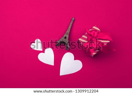 Valentines day greeting card. gift box on red table. Top view with copy space