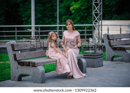 mom and daughter in the open air