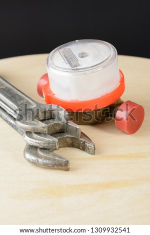 wrenches and water meter