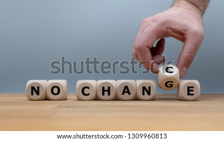 No change, no chance. Hand turns a dice and changes the expression "no change" to "no chance"