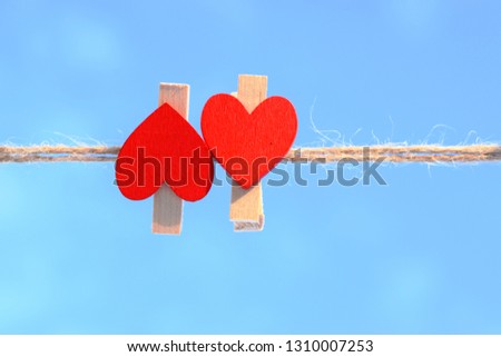 Wooden heart on a blue background