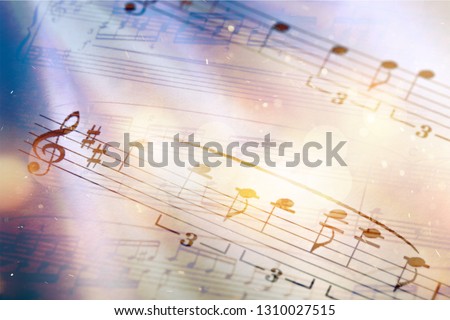 Sheets with music notes, close-up view Royalty-Free Stock Photo #1310027515