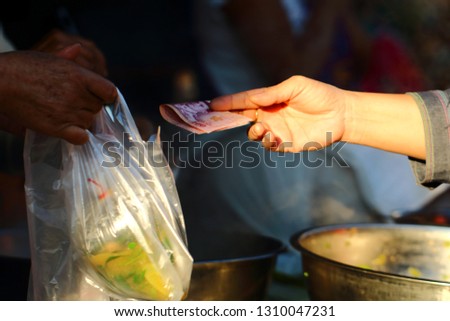 Marketing, trading in the market, buying with cash,shopping in supermarket and paying with card.