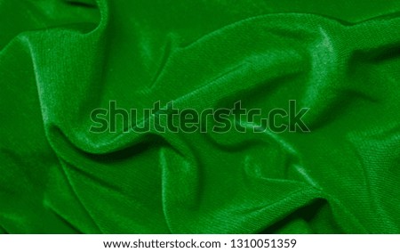 Realistic flag of Libya on the wavy surface of fabric