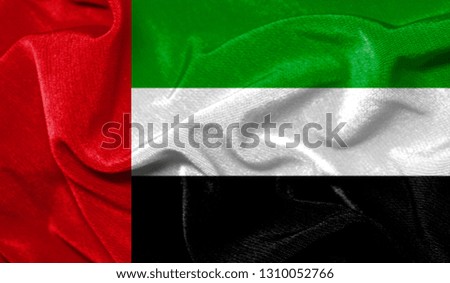 Realistic flag of United Arab Emirates on the wavy surface of fabric