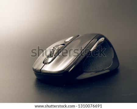black pc mouse wireless on black background