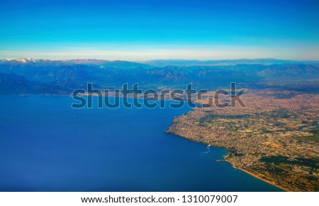 Blurred Antalya bay in Turkey from airplane windows