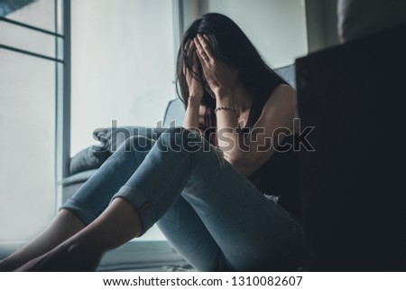 panic attacks young girl sad and fear stressful depressed emotional.crying use hands cover face begging help.stop abusing domestic violence in women,person with health anxiety,people bad feeling down Royalty-Free Stock Photo #1310082607
