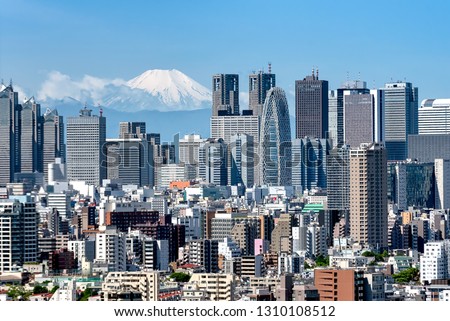 Tokyo, Shinjuku building cityscape and Mt. Fuji at Behind. Royalty-Free Stock Photo #1310108512