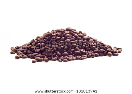 a handful of hot roasted coffee beans isolated on white