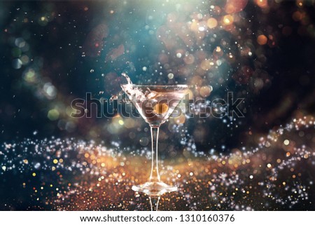Martini cocktail isolated  on dark white